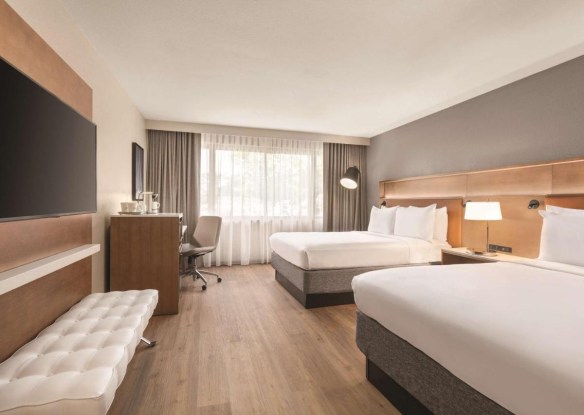 Two king beds in a hotel room
