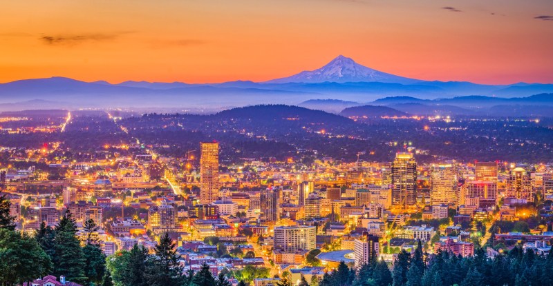 Portland, Oregon, USA downtown skyline with Mt. Hood at dawn.