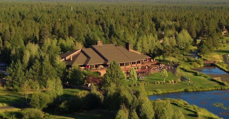 resort sitting amongst a landscape of trees and greenery